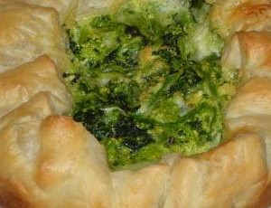 torta-salata-sfiziosa-con-cime-di-rapa-e-oliv-T-0Ztyw7