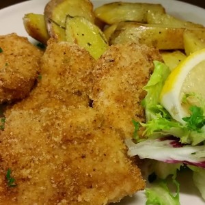 milanesine di pollo con patate al forno